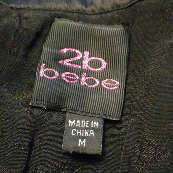 BeBe- Deep v-neck blouse - Never Worn - Picture 6 of 7